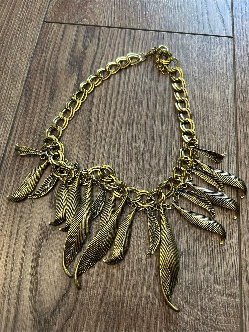 Gold Leaf Charm Necklace - Elegant Women's Statement Jewelry